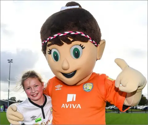  ??  ?? Aoibheann Rankin (11) of Forth Celtic with Aviva Soccer Sisters mascot Cara during the Aviva Soccer Sisters Golden Camp in Abbotstown.