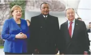  ?? ADAM BERRY / GETTY IMAGES FILES ?? Despite its petroleum riches, Congo is nearly bankrupt after years of corruption under President Denis Sassou Nguesso, centre, here with German Chancellor Angela Merkel and UN Secretary General Antonio Guterres.