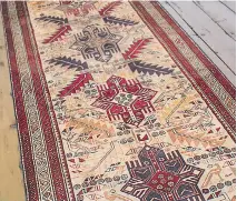  ?? PHOTO COURTESY OF RONAK KORDESTANI ?? A vintage Persian rug runner adds colour and life to any room, and can be used to define a hallway type of space even where there is no hallway.