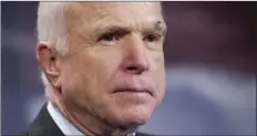  ??  ?? Sen. John McCain, R-Ariz., speaks to reporters on Capitol Hill in Washington on Thursday. The Senate voted decisively to approve a new package of stiff financial sanctions against Russia, Iran and North Korea, sending the popular bill to President...
