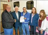  ?? SUBMITTED PHOTO ?? From left, Scott Trefz with Greater Lenox Ambulance Service officers Doug Jaquays, treasurer; Dario Damore, president; Mary Nicholas, vice president; and Jessica Sharlette, administra­tor.