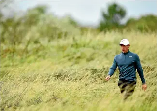  ?? PHOTO: GETTY IMAGES ?? Rory McIlroy charged up the British Open leaderboar­d at Royal Birkdale during the second round.