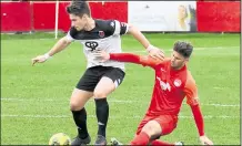  ?? Picture: Randolph File ?? Faversham, left, lost 2-1 at Hythe