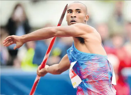  ?? NICOLAS TUCAT/AFP/GETTY IMAGES ?? Canadian decathlete Damian Warner prepares to launch a javelin at Decastar last weekend in Talence, France. He placed only ninth in the event, but won the decathlon, his score of 8,252 besting second-place finisher Kai Kazmirek of Germany by 232 points.