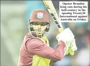  ?? ?? Opener Brandon King cuts during his half-century in the opening Twenty20 Internatio­nal against Australia on Friday.