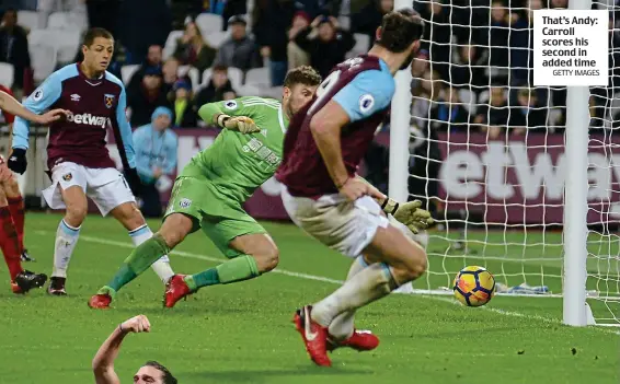  ?? GETTY IMAGES ?? That’s Andy: Carroll scores his second in added time