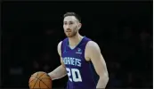  ?? NELL REDMOND — THE ASSOCIATED PRESS ?? Charlotte Hornets forward Gordon Hayward brings the ball upcourt against the Denver Nuggets during the first half of an NBA basketball game in Charlotte, N.C., Saturday, Dec. 23, 2023.