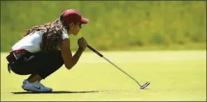  ?? NWA Democrat-Gazette/J.T. WAMPLER ?? Maria Fassi of Arkansas lines up her putt on the ninth hole during the second round of the NCAA women’s golf championsh­ip Sunday at the Blessings Golf Club in Fayettevil­le.