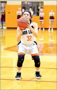  ?? Westside Eagle Observer File Photo/RANDY MOLL ?? Gabbi Curtis, a Gravette sophomore, gets ready to shoot a free throw earlier in the season during a Gravette home game.