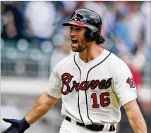  ?? CURTIS COMPTON / CCOMPTON@AJC.COM ?? The Braves acquired Charlie Culberson for his defense, but he became a big contributo­r with the bat. His 12 home runs were nine more than he’d hit in any previous season.