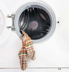  ?? GETTY IMAGES/ISTOCK PHOTO ?? A reader suggests using clothespin­s to keep pairs of socks together when doing the laundry.