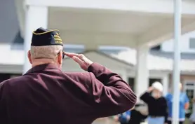  ??  ?? U.S. Army Ret. Sr. Vice Commander Robert Habern salutes the flag during the ceremony in honor of National Former Prisoners of War Recognitio­n Day.