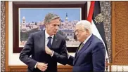  ?? Ronaldo Schemidt/pool/afp/getty Images/tns ?? Palestinia­n President Mahmud Abbas, right, welcomes U.S. Secretary of State Antony Blinken in Ramallah.