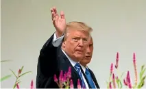  ?? PHOTO: REUTERS ?? President Donald Trump talks with Vice President Mike Pence as they walk along the Colonnade at the White House.