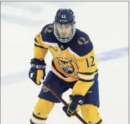  ?? Stew Milne / Associated Press ?? Quinnipiac’s Oliver Chau finds himself on the top-ranked team in the country a season after winning a national title at UMass.