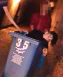  ??  ?? Callous: Chris Gorman in a wheelie bin. This photo was posted by his disgusted brother