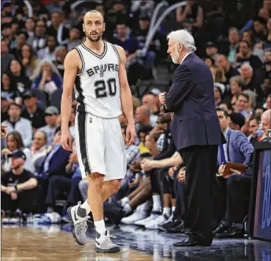  ?? RONALD MARTINEZ / GETTY IMAGES ?? Despite his Spurs being overmatche­d against the Warriors, Manu Ginobili rediscover­ed his stroke with six double-digit performanc­es in his last six playoff games. Spurs coach Gregg Popovich is at right.