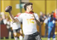  ?? Steve Luciano / Associated Press ?? AFC quarterbac­k Patrick Mahomes throws a pass during Pro Bowl practice on Friday in Kissimmee, Fla.