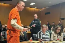  ?? AP PHOTO ?? GUILTY COUPLE
James Crumbley (far left) speaks before his sentencing for involuntar­y manslaught­er in a school shooting committed by his son Ethan as his wife Jennifer (in stripes) listens inside a courtroom in Pontiac, Michigan on Tuesday, April 9, 2024.