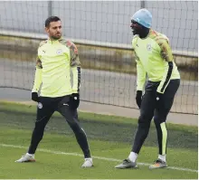  ?? Reuters ?? Manchester City’s Bernardo Silva with Benjamin Mendy