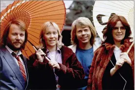  ??  ?? Members of the pop group ABBA, from left, Benny Andersson, Agnetha Foltskog, Bjorn Ulvaeus and Anni-frid Lyngstad, appear in Tokyo on March 14, 1980.