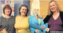  ??  ?? Read all about it Barbara Boertien of Almond Housing, Angela Fuggle of Beanstalk and Kirsteen Watson, of the Dollywood Foundation.