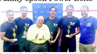 ?? CONTRIBUTE­D ?? Tarun Handa (third left), managing partner for KPMG in Jamaica, applauds as members of the Adams Family (from left) Robert Roper, Adam Hugh, Adam Lee and Allan Roper display their trophies after winning the 2019 KPMG Squash League, which wrapped up at the Liguanea Club at the weekend. The first-time entrants beat the Power Bolts 3-0 to win the title. Also on hand to congratula­te the new champions is Chris Hind, president of the Jamaica Squash Associatio­n.
