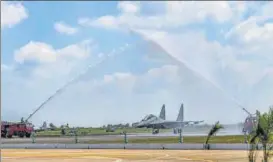  ?? PTI ?? A ‘water salute’ is given to Sukhoi-30 MKI fighter aircraft at the Thanjavur airbase on Monday. n