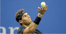  ?? GETTY IMAGES ?? Rafael Nadal serves against Andrey Kuznetsov during his third-round win yesterday.