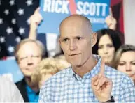  ?? AP ?? Rick Scott’s U.S. Senate bus tour came to Orlando after hitting snags in red tide-affected Southwest Florida.