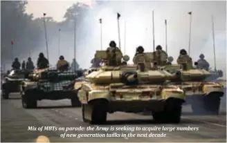  ??  ?? Mix of MBTs on parade: the Army is seeking to acquire large numbers
of new generation tanks in the next decade