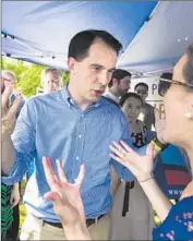  ?? Jim Lo Scalzo European Pressphoto Agency ?? WISCONSIN GOV. Scott Walker, shown at a GOP event in Woodbridge, Va., has fallen in the polls.