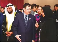  ?? Arshad Ali/Gulf News ?? Ni Jian and Dr Maitha Bint Salem Al Shamsi with other officials during the Chinese National Day in Abu Dhabi.