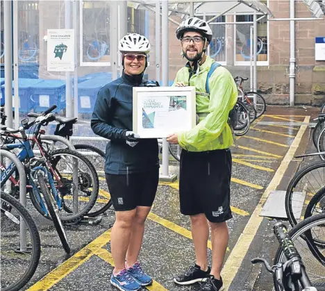  ??  ?? ABERTAY University has once again achieved recognitio­n for its cyclefrien­dly approach.Cycling Scotland has awarded the university Cycle Friendly Employer status in recognitio­n of supporting a “culture of cycling”.Iain Stewart, a teaching fellow at Dundee Academy of Sport, cycles in