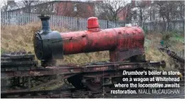  ?? NIALL McCAUGHAN ?? Drumboe’s boiler in store on a wagon at Whitehead where the locomotive awaits restoratio­n.