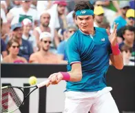  ?? MAX ROSSI / REUTERS ?? Milos Raonic of Canada hits a return en route to beating Tommy Haas of Germany in their second-round match at the Rome Masters on Wednesday.