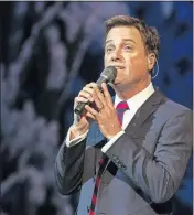  ?? [KATIE DARBY/INVISION/AP FILE] ?? Michael W. Smith performs in 2014 at the Fox Theatre in Atlanta.