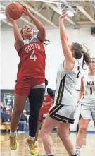  ?? ?? South High’s Bryan Bascones scores a basket during Saturday’s game against Notre Dame Academy of Hingham.