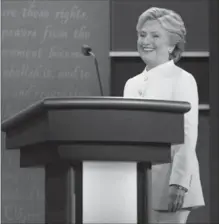  ?? ANDREW HARNIK, THE ASSOCIATED PRESS ?? Democratic presidenti­al candidate Hillary Clinton takes the stage for the final presidenti­al debate at the University of Nevada Wednesday.