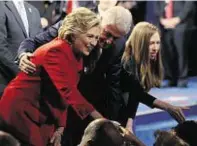  ??  ?? Hillary Clinton, husband Bill and daughter, Chelsea