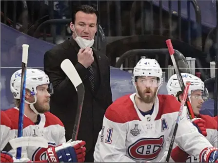  ?? The Canadian Press ?? Montreal Canadiens assistant head coach Luke Richardson, seen standing, during Game 2 of the NHL hockey Stanley Cup finals against the Tampa Bay Lightning.