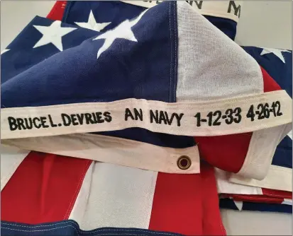  ?? PHOTO BY CAROLE HESTER ?? The flag of Bruce L. Devries, a Navy Veteran and the former Principal of Yokayo Elementary School-ukiah, who died in April 2012. Along with 467other families, his flag was donated to Post 1900for posting on Memorial Day.