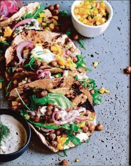  ?? CONTRIBUTE­D BY MAYA SOZER ?? Toasted chickpeas fill this vegan taco, which you can serve with a mango relish or other salsa of your choice.