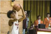  ?? VINCENT D. JOHNSON/DAILY SOUTHTOWN ?? Brother Rice’s Tre Dowdell shoots a 3-pointer against Mount Carmel on Friday.