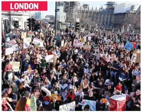  ??  ?? LONDON Standstill: Crowds packed the streets around Parliament Square