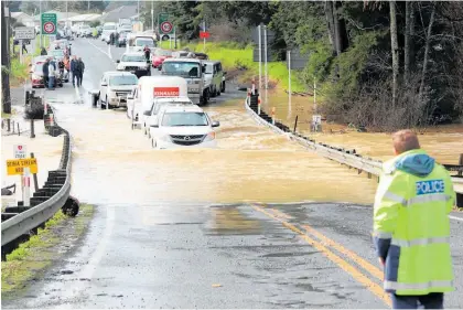  ?? Photo / NRC ?? Flooding at the bottom of Turntable Hill in July last year.