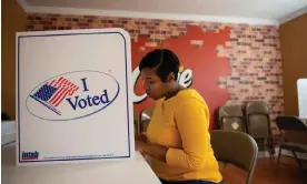  ?? ?? A voter casts a ballot in Mississipp­i. Photograph: Lauren Witte/AP