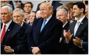  ?? CHIP SOMODEVILL­A / GETTY IMAGES ?? President Donald Trump celebrates the passing of the Tax Cuts and Jobs Act with Senate and House Republican­s at the White House on Dec. 20. The tax bill is the first major legislativ­e victory for the GOP-controlled Congress and Trump.