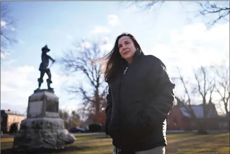  ?? (AP/Jessica Hill) ?? Beth Caruso, author and co-founder of the CT Witch Trial Exoneratio­n Project, which was created to clear the names of accused witches, stands Jan. 24 on the Palisado Green in Windsor, Conn., where in 1651, an accident during a local militiamen training exercise led to the accusation of witchcraft and hanging of Lydia Gilbert.