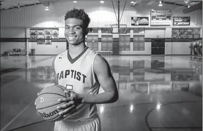  ?? Arkansas Democrat-Gazette/STEPHEN B. THORNTON ?? Sophomore Issac McBride averaged 20 points per game this season and helped lead Baptist Prep to its second consecutiv­e state championsh­ip. He scored 20 points in the Class 4A championsh­ip game and was named the tournament MVP.